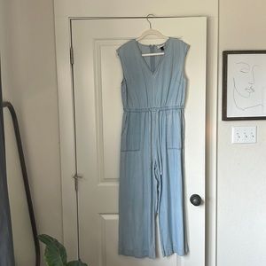 light wash denim jumpsuit.